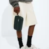 Kleine Intrecciato-Pouch mit Handschlaufe Kleine Intrecciato-Pouch mit Handschlaufe