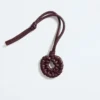 Muschel-Knot-Anhänger Muschel-Knot-Anhänger