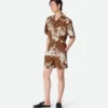 Seidenshorts mit italienischem Postkartenprint Seidenshorts mit italienischem Postkartenprint