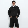 Verwaschene schwarze Jeansjacke Verwaschene schwarze Jeansjacke