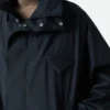 Zusammenpackbare Nylon-Blouson mit Kapuze Zusammenpackbare Nylon-Blouson mit Kapuze